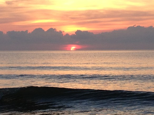 ....and then the whole sky is awash with colour as the sun itself peers over the horizon.