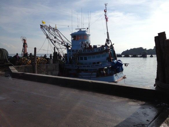 The fishermen unload their catch......