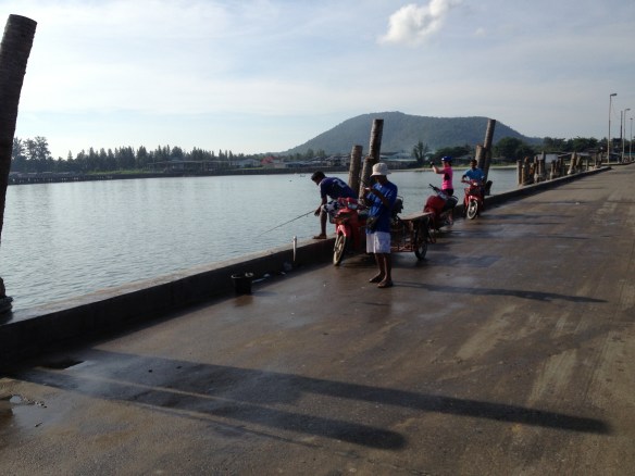 ....whilst others try their luck from the jetty.