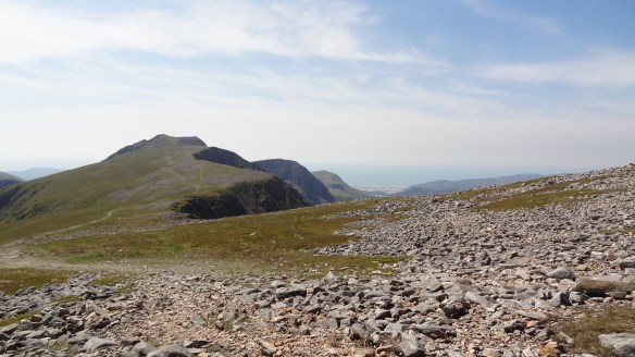 Looking up to Cadair Idris from Mynydd Moel, the Irish Sea in the distance.