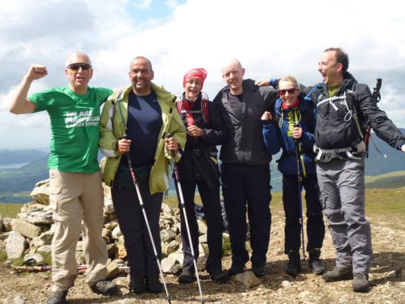 A celebratory moment atop Peak 24, Watson's Dodd.