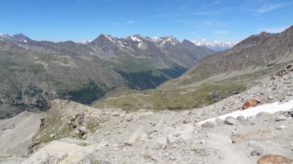 And finally upon reaching the bottom of the glacier, our hut appears a long way in the distance, middle of picture.