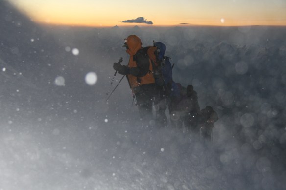 The dawn starts to appear and the clouds start to lift too, although the steepness of the mountain hasn't relented yet.