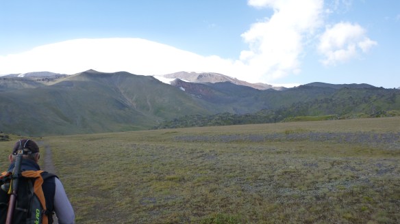 Heading across the flat area known as 'the airfield', actually a German base during WW2.
