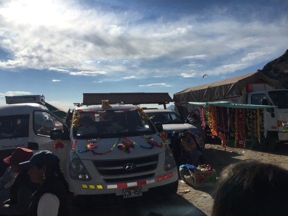 The Peruvians like to dress up their cars and vans for the part too!