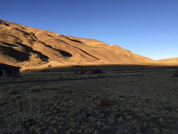 The sun nearly reaches our tents at our first morning waking under canvas.