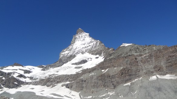 Approaching the Matterhorn - the Hornlihutte is on the tip of snow at about 3pm on the picture.